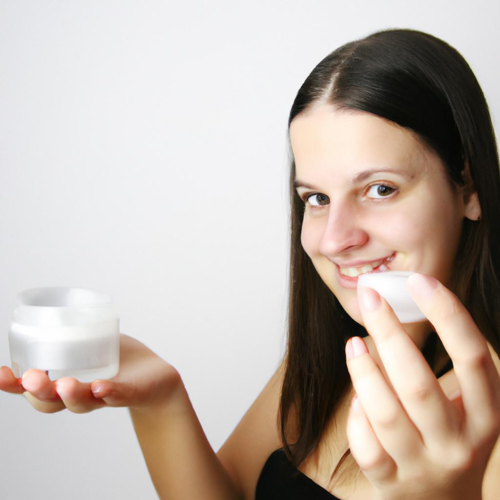 Person applying skincare products, smiling
